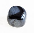 tumbled hematite (haematite) gem stone on white