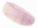 tumbled mangano calcite gem stone on white