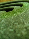 Macro photography of rolls green sponges. Partially blurred. Selective focus