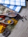 Macro photography of spices and kitchen tools on wooden table Royalty Free Stock Photo