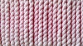 Macro photography of the texture of a knitted pattern in close-up pink Royalty Free Stock Photo