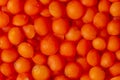 Macro picture of orange red lentils - a family of legumes, a source of protein. Food for vegetarians, gluten-free cereal. Proper