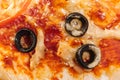 Macro pizza with tomatoes, cheese and olives