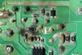 Macro of the rearside of a circiut board of some cheap electronic equipment. Some small components have exploded, and the board is Royalty Free Stock Photo