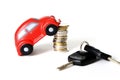 Macro of a red toy car on a pile of euro coins Royalty Free Stock Photo