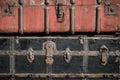 Old vintage antique suitcases trunks in a stack background Royalty Free Stock Photo