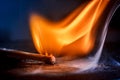 Macro shooting of a burning match with a flame of fire and smoke Royalty Free Stock Photo