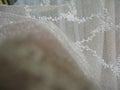 Openwork transparent fabric background beige Royalty Free Stock Photo