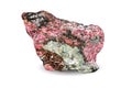 Macro shooting of natural gemstone. Natural rock specimen of eudialyte. object on a white background.