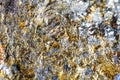 Macro shooting of natural gemstone. The texture of the mineral chalcopyrite. Abstract background.