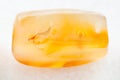 cabochon from yellow Agate gemstone on white Royalty Free Stock Photo