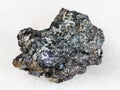Molybdenite crystal in Glaucophane stone on white Royalty Free Stock Photo