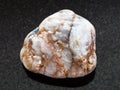 pebble of marble stone on dark background