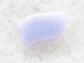 polished blue lace agate gemstone on white marble Royalty Free Stock Photo