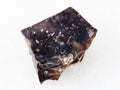raw black Flint stone on white