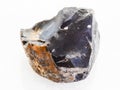 raw black Flint stone on white marble