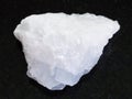 raw crystalline Magnesite stone on dark