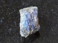 raw labradorite stone on dark background Royalty Free Stock Photo