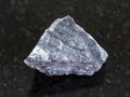 raw stibnite (antimonite) ore on dark