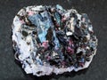 rough Gneiss stone with crystals on dark