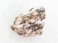 rough Gneiss stone on white marble