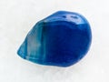 tumbled blue toned agate gemstone on white Royalty Free Stock Photo