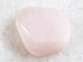 tumbled pink petalite gemstone on white Royalty Free Stock Photo