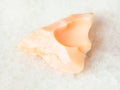 rough precious opal gemstone on white