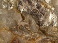 natural mineral stone -  Muscovite in Quartz Dioctahedral mica, common mica isinglass potash mica  .It is a hydrated phyllosili Royalty Free Stock Photo