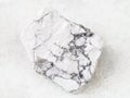 Raw Howlite stone on white Royalty Free Stock Photo