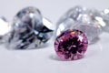 Macro shoots of pink color round shaped shiny diamond isolated Royalty Free Stock Photo