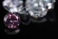 Macro shoots of pink color round shaped shiny diamond isolated Royalty Free Stock Photo