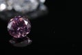 Macro shoots of pink color round shaped shiny diamond isolated Royalty Free Stock Photo