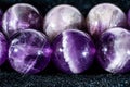 macro shot of amethyst round beads Royalty Free Stock Photo