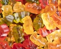 Macro shot assorted colorful gummy candies. Top view candy pattern. Jelly bears background texture