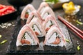 Macro Shot of Bacon Uramaki Sushi Rolls in Restaurant Closeup