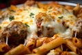 Macro Shot of Baked Ziti with Meatballs and Parmesan Cheese on Top