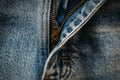 Macro shot of blue denim jeans with opened zipper Royalty Free Stock Photo