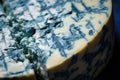 macro shot of blue mold veins in a blue cheese wheel Royalty Free Stock Photo