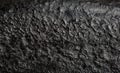 Macro shot of bottom of old cast iron frying pan Royalty Free Stock Photo