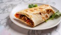 macro shot of a burrito on a plate with a servery table on a white marble countertop