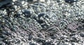 Close-up of shimmering silver bubbles creating a mesmerizing abstract pattern Royalty Free Stock Photo