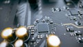 Macro shot of central processor chip on printed circuit board with capacitors, modern computer hardware and semiconductor Royalty Free Stock Photo