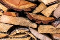 Macro shot of chopped pine wood stacked in pile Royalty Free Stock Photo