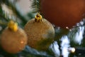 macro shot of christmas decorations shimmering golden balls