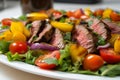 Macro shot of a colorful and fresh Churrasco salad with grilled vegetables, juicy steak, and tangy vinaigrette dressing Royalty Free Stock Photo