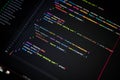 Macro shot of colorful programming code on computer screen, showcasing software development, coding process, and error handling in Royalty Free Stock Photo