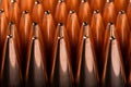 Macro shot of copper bullets that are in many rows