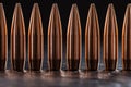 Macro shot of copper bullets that are in one row