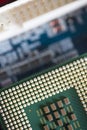 Macro shot of CPU against electric circuit board or motherboard Royalty Free Stock Photo